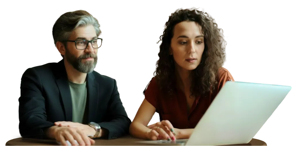 Team reviewing operations together on a laptop