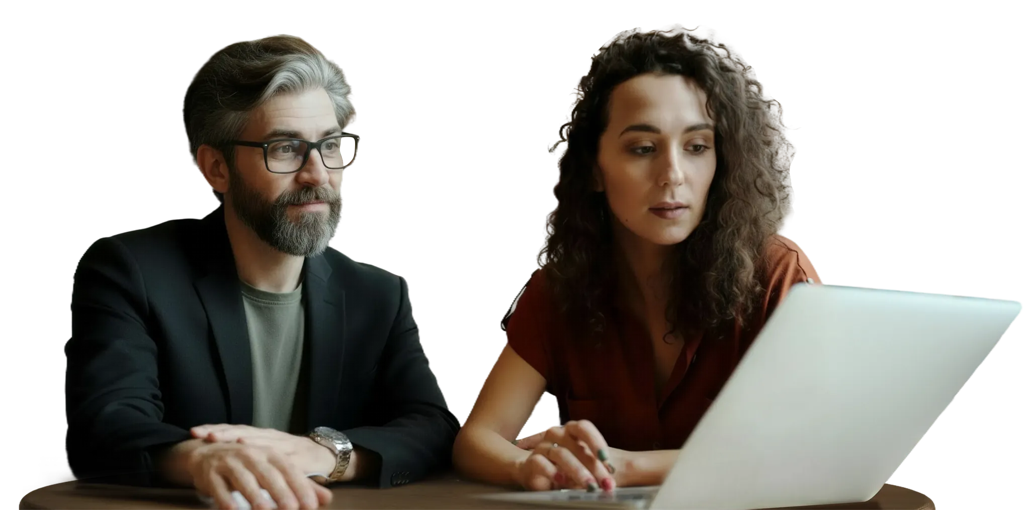 Team reviewing operations together on a laptop