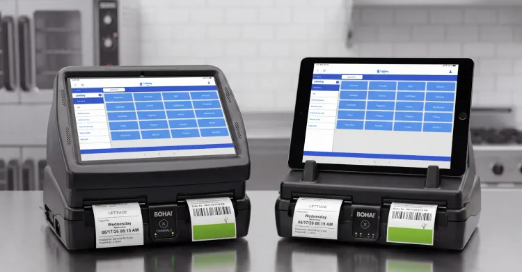 BOHA! Terminal 2 and BOHA! WorkStation food labeling hardware side by side in a commercial kitchen, showing fixed and mobile labeling workflows.