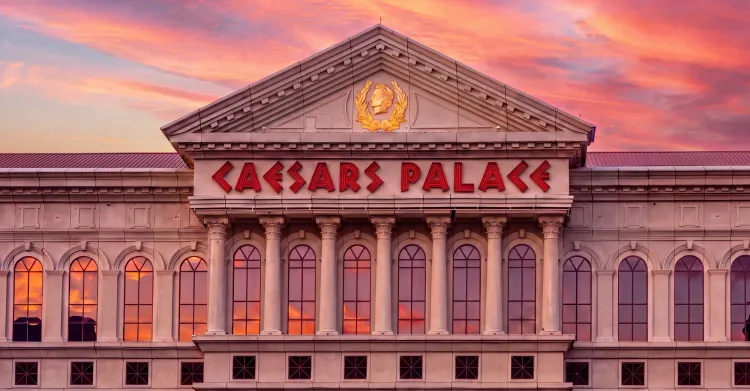 Exterior view of Caesars Palace Las Vegas lit up at night celebrating its 60th anniversary