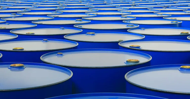 Oil barrels representing oil volatility and its impact on foodservice operations, labeling workflows, and operational resilience.