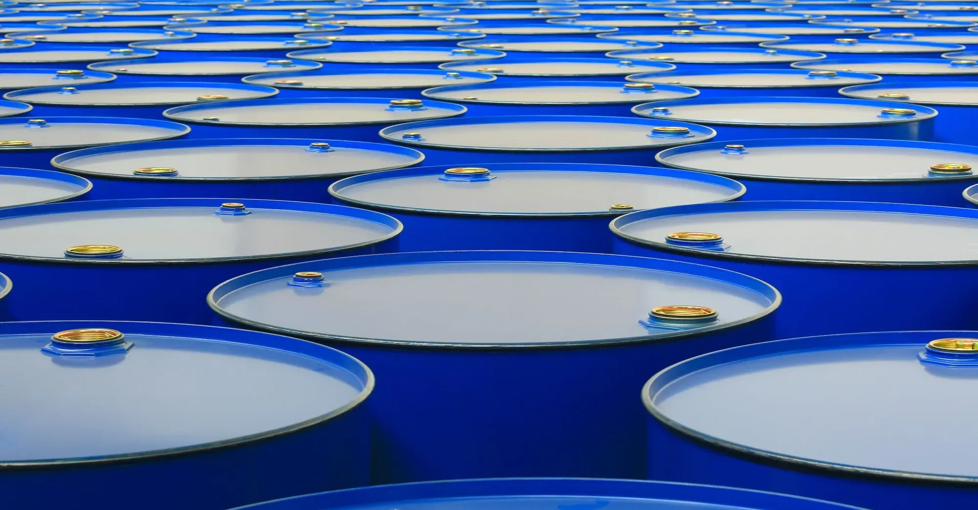 Oil barrels representing oil volatility and its impact on foodservice operations, labeling workflows, and operational resilience.