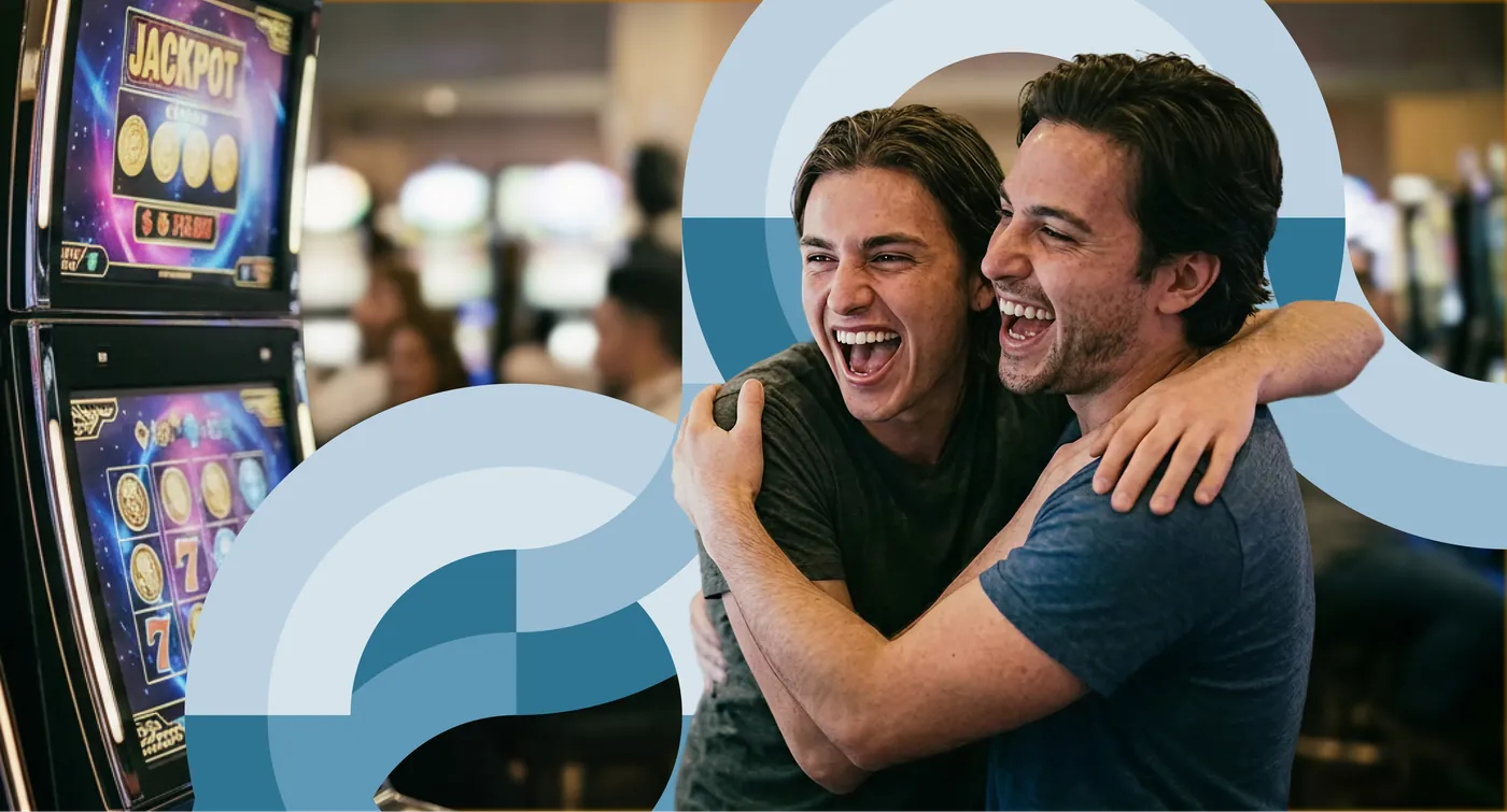 Two casino guests celebrating a win at a gaming machine