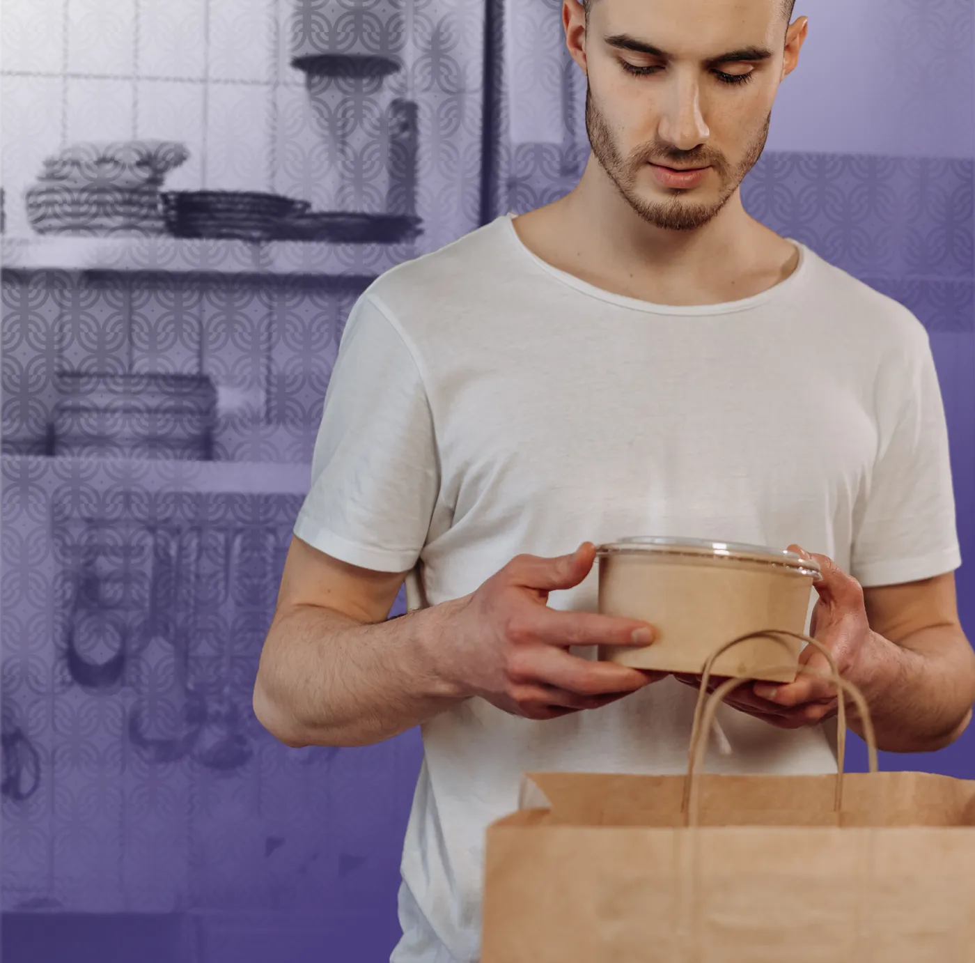 A worker holding a packed takeout bowl, in purple duotone