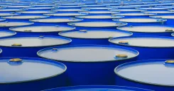 Oil barrels representing oil volatility and its impact on foodservice operations, labeling workflows, and operational resilience.